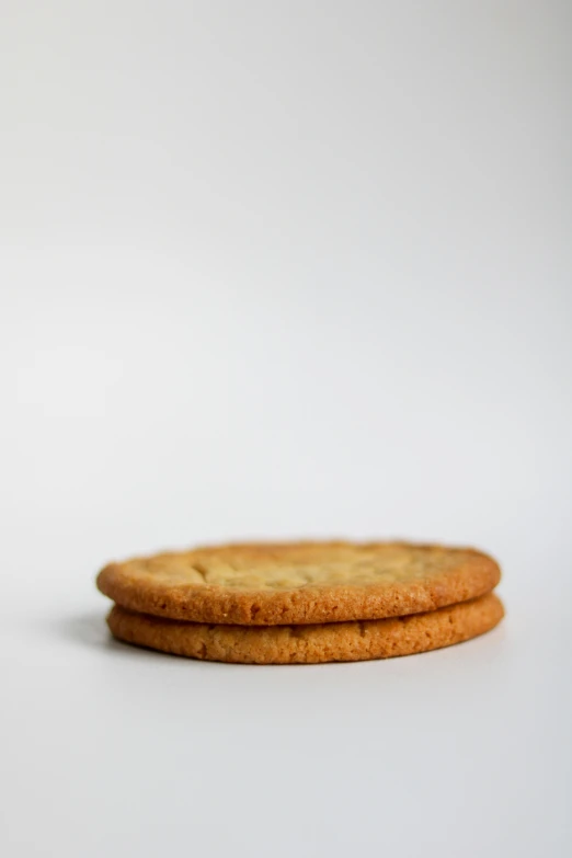 two cookies that are sitting on a table