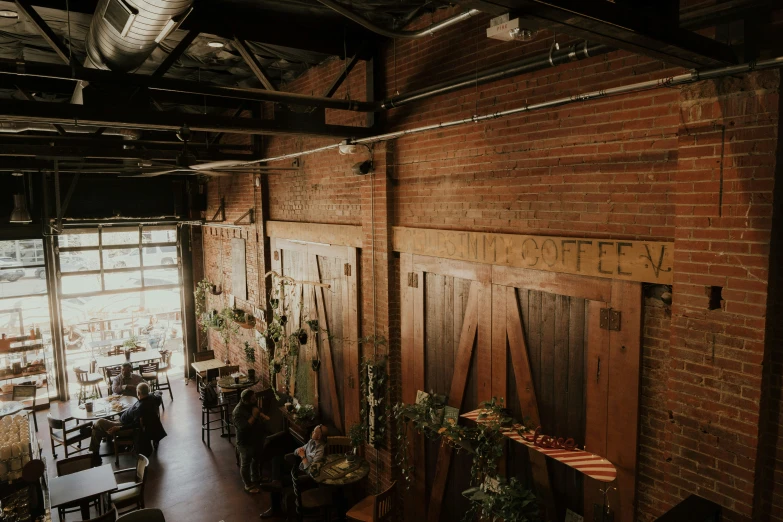 the walls in a warehouse are filled with plants