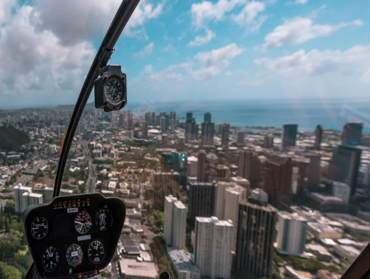 a view out a plane window of a city