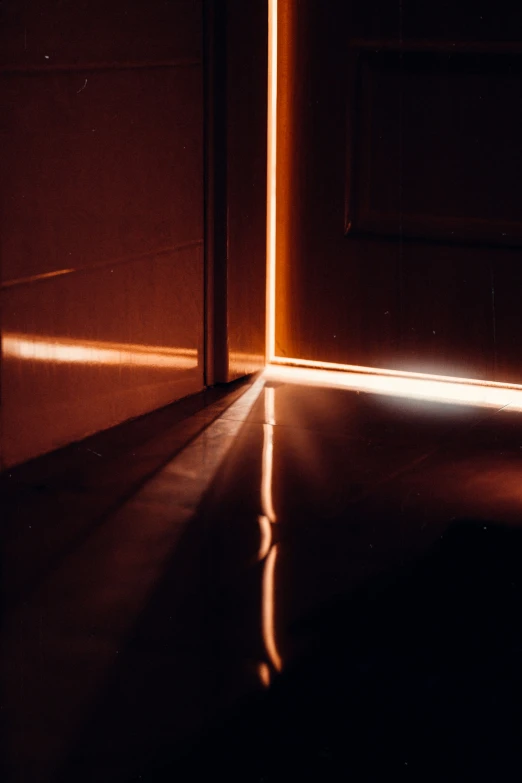 a doorway opened in an empty house at night