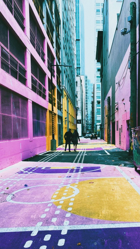 a dog standing in a colorful city street