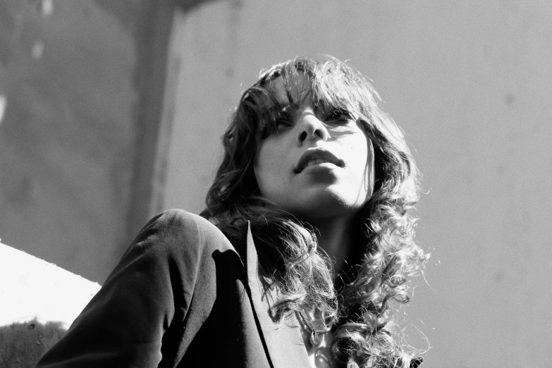 black and white pograph of a woman looking up