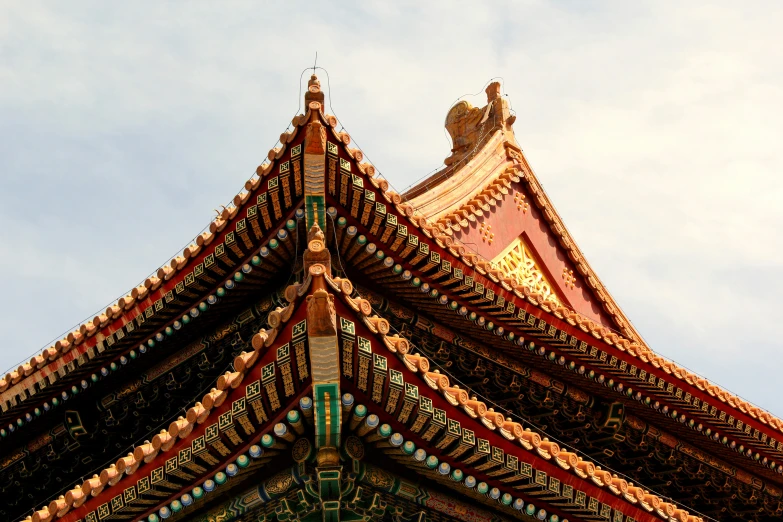 a decorative building with a sky in the background