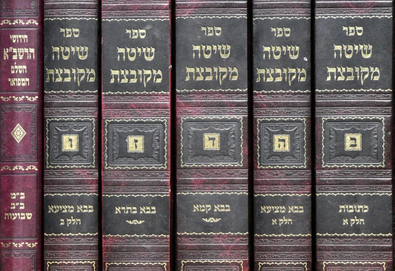 seven hardcover books set up together in many languages