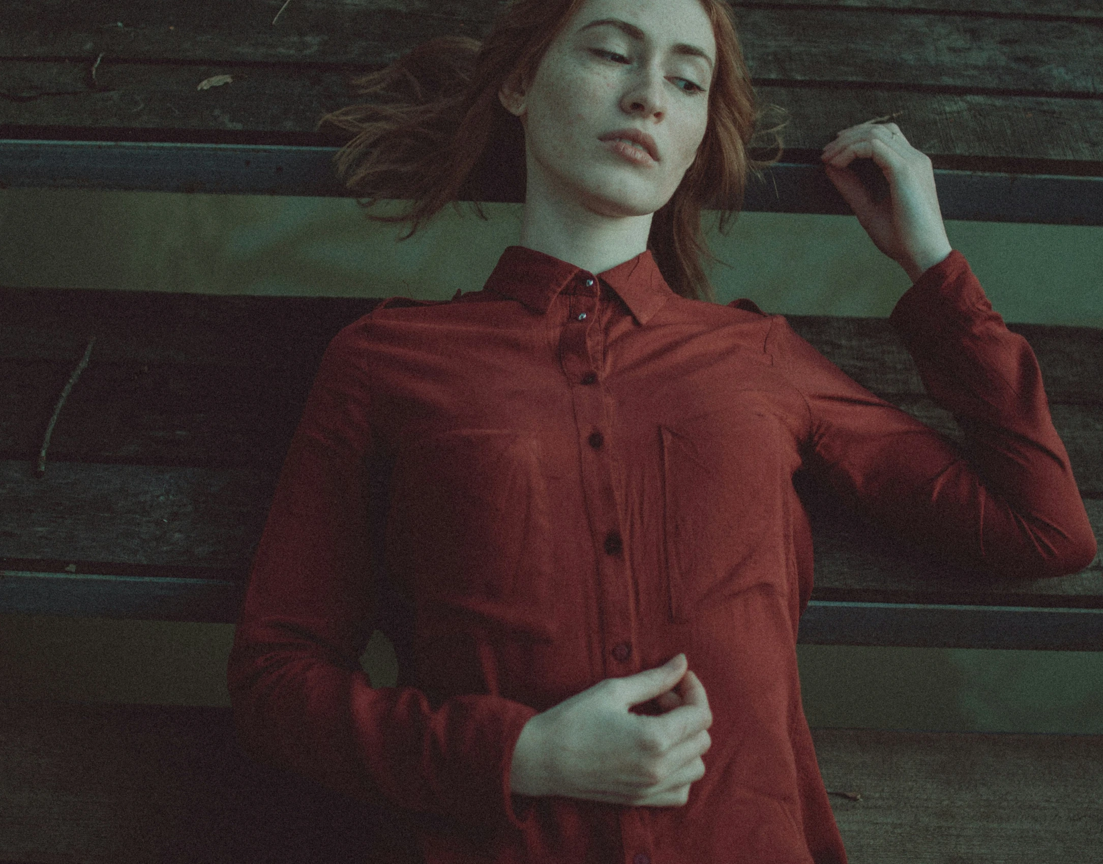 woman sitting on steps with her eyes closed