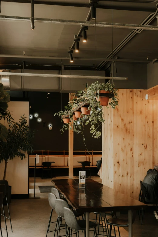 a long table with four chairs next to it