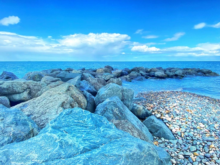 an image of a rocky shoreline in the distance