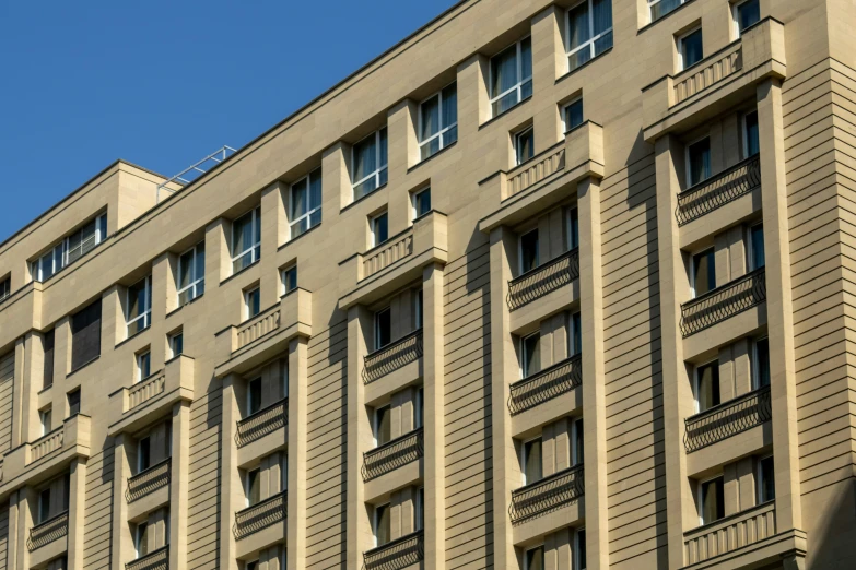 an old building with multiple balconies and a clock