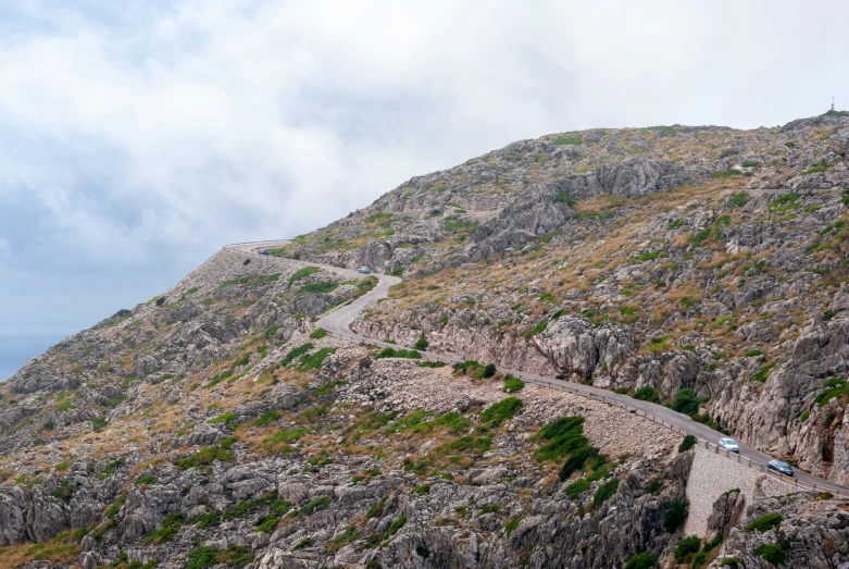 the road up to the top of the mountains leads to a tunnel