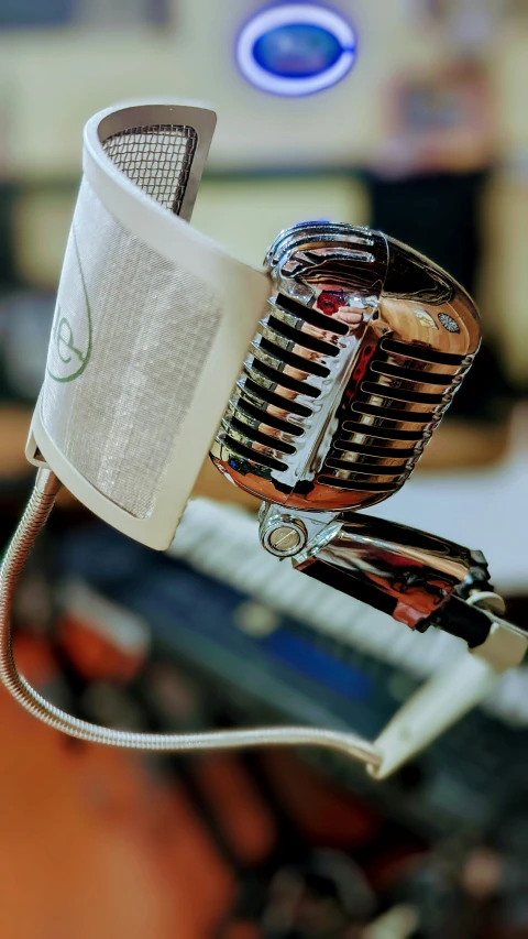 a close up image of a microphone with a cord