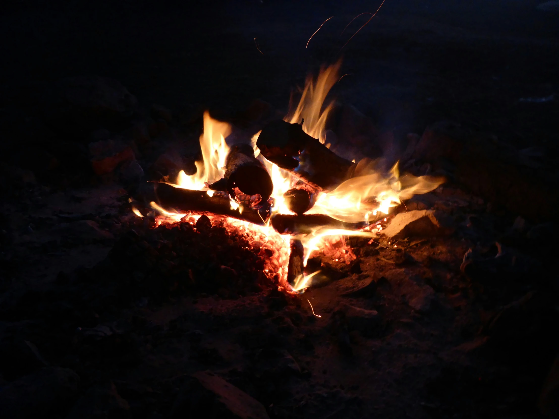 a close up of fire and coal inside of it