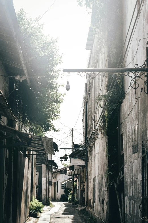 a small street with old brick buildings lining it