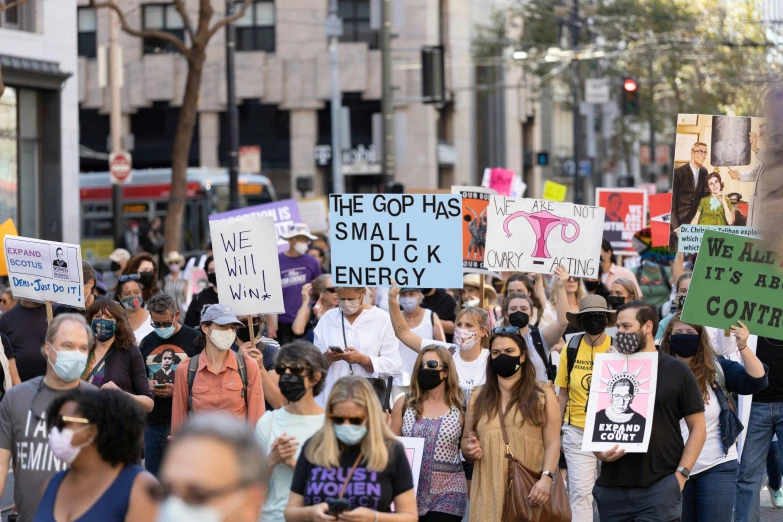 the protest march is one of several onlookers heading towards the capitol