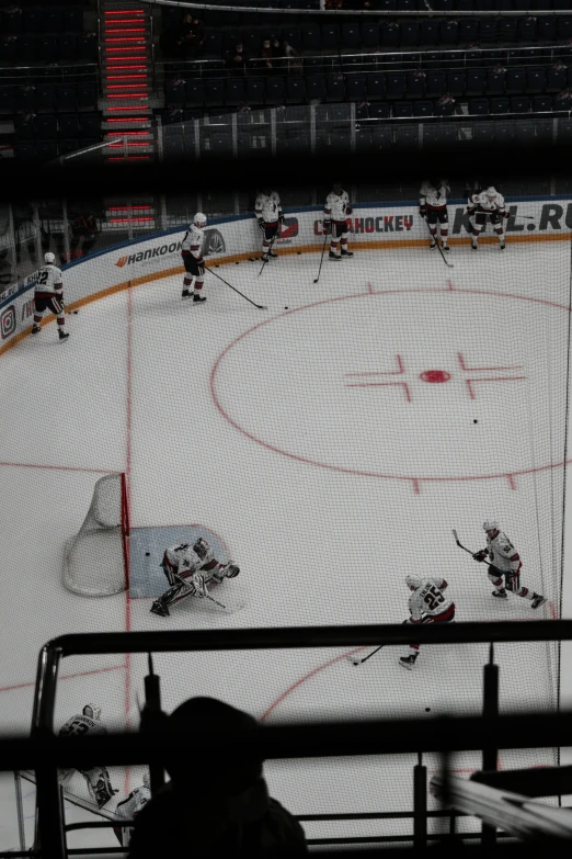 there is a hockey game being played on the ice