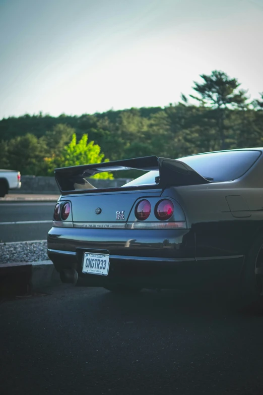 a rear - end s of a mustang muscle car