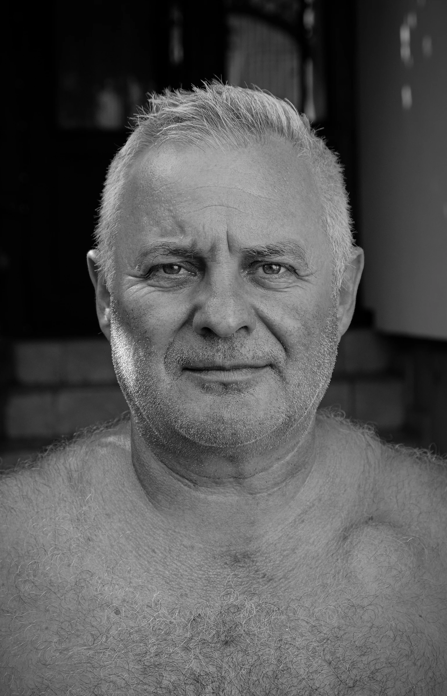 a man in the shower is posing for a picture