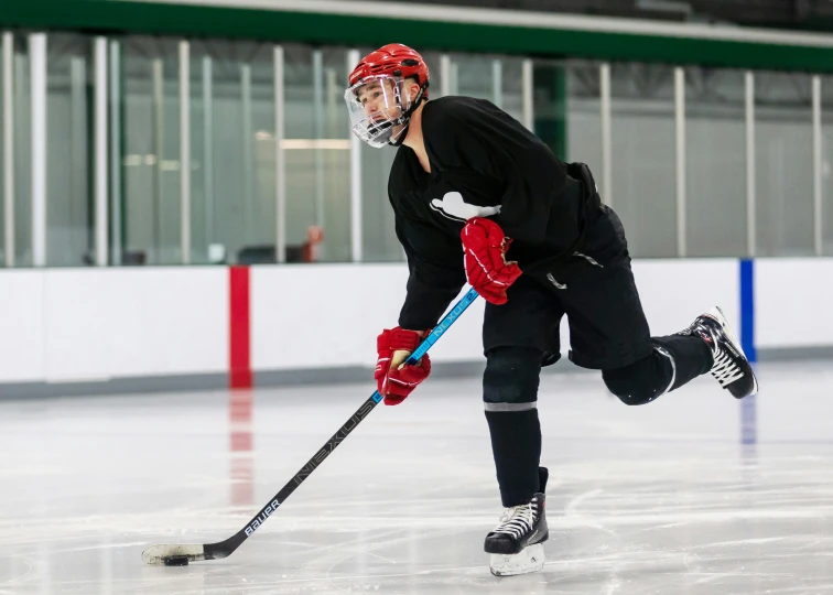 a person in action on a ice rink