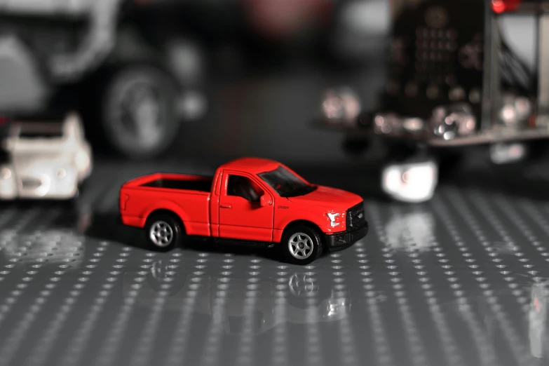 toy cars sitting next to each other on a table