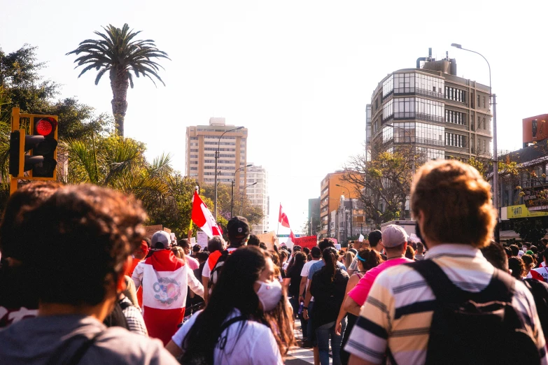 there is a lot of people in the street marching