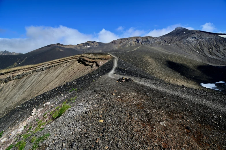 a hill that is steep and has some dirt on the ground