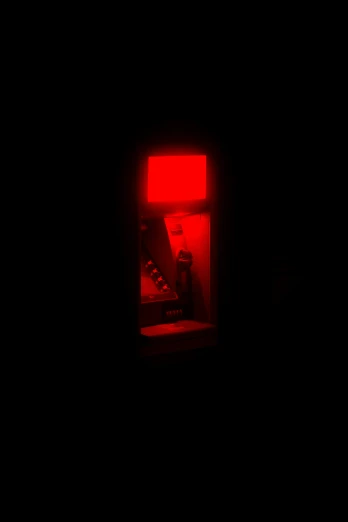 the red light in a room shows the red