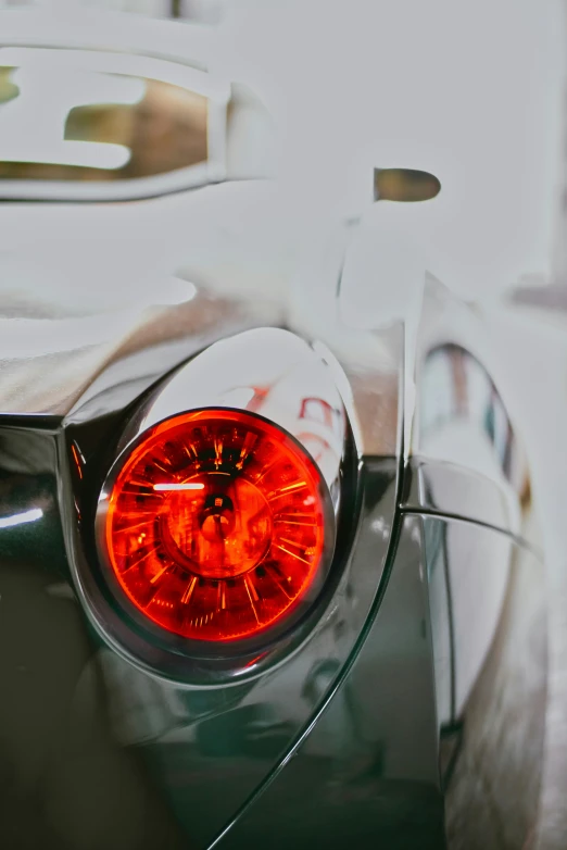 a close up view of an old car with an odd light shining on it