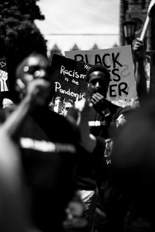 a person is holding some signs in front of them