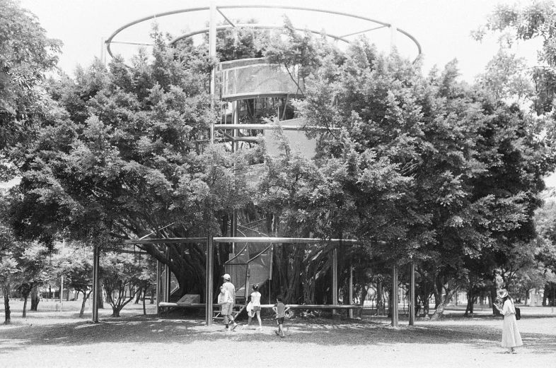 an old po of people walking down the sidewalk