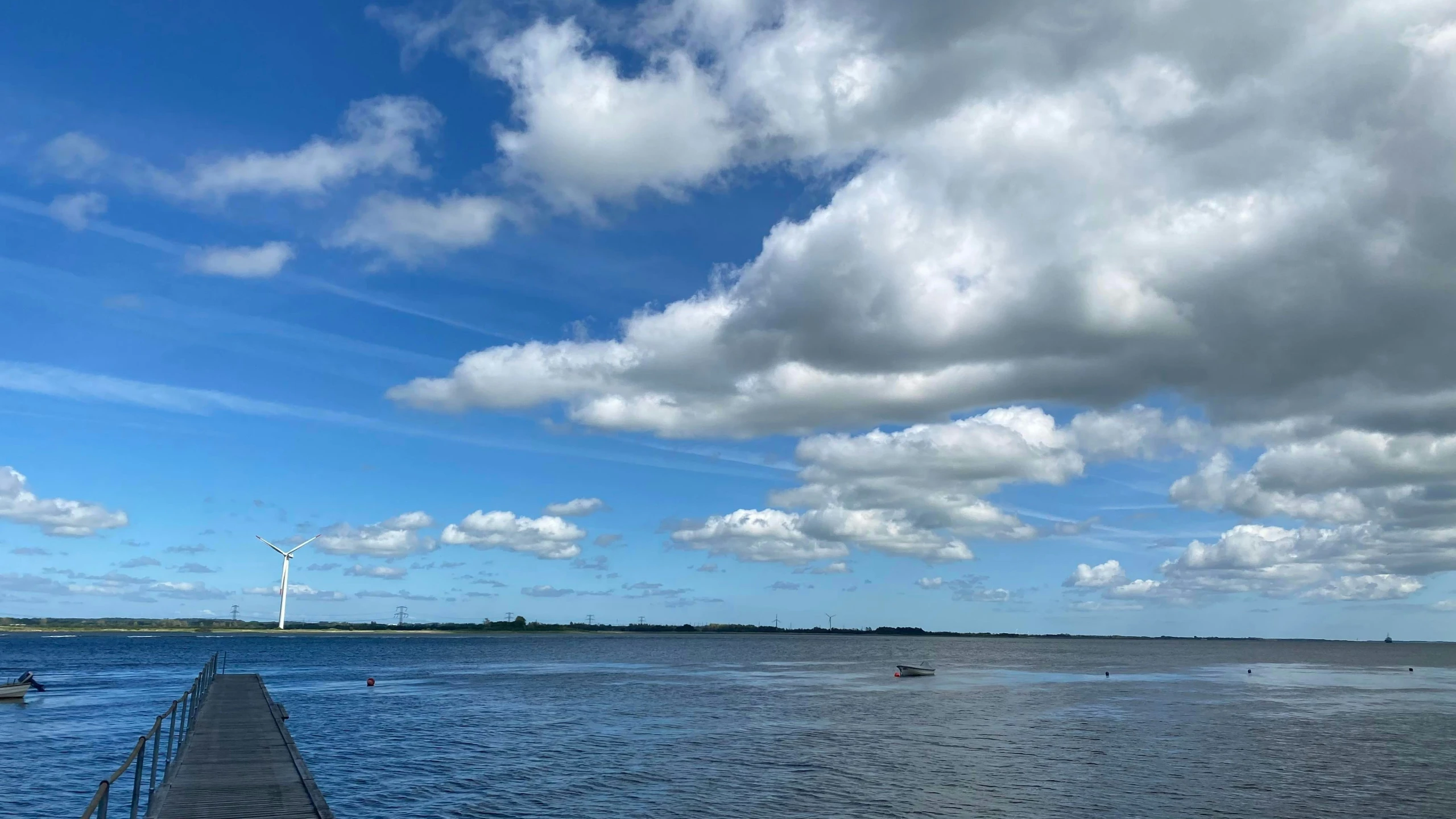 the water on the pier is very blue and cloudy