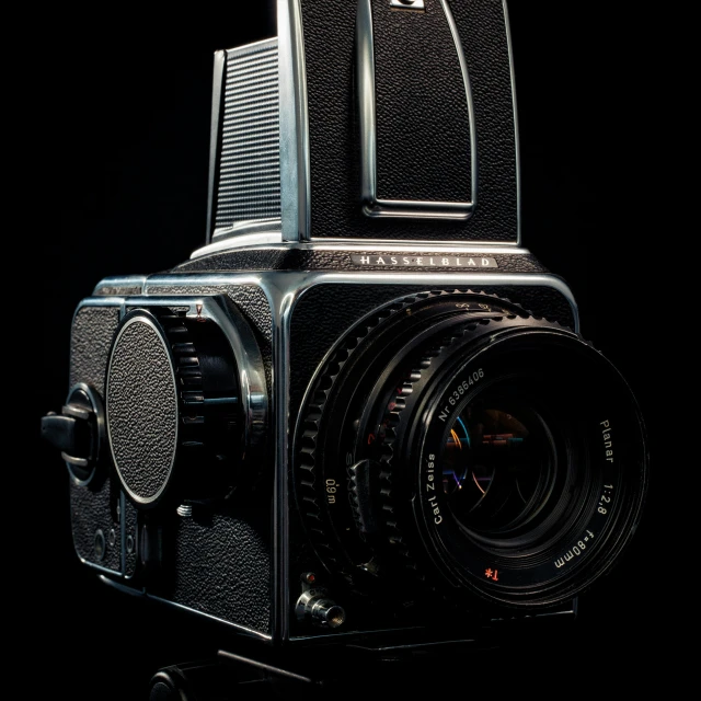 a vintage camera with an unusual lens