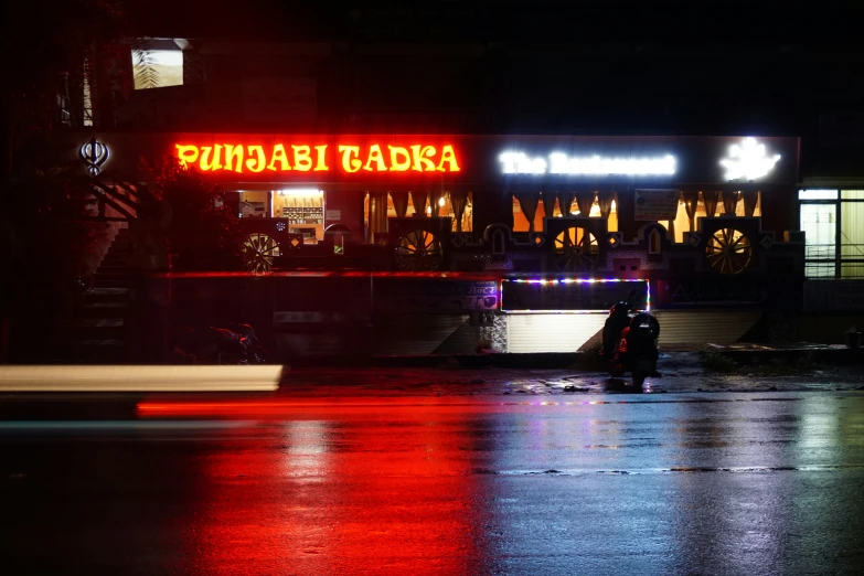 a bar that is next to a street