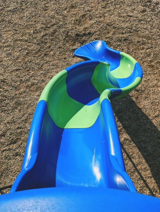 a view from above, looking down at a blue and green play ring