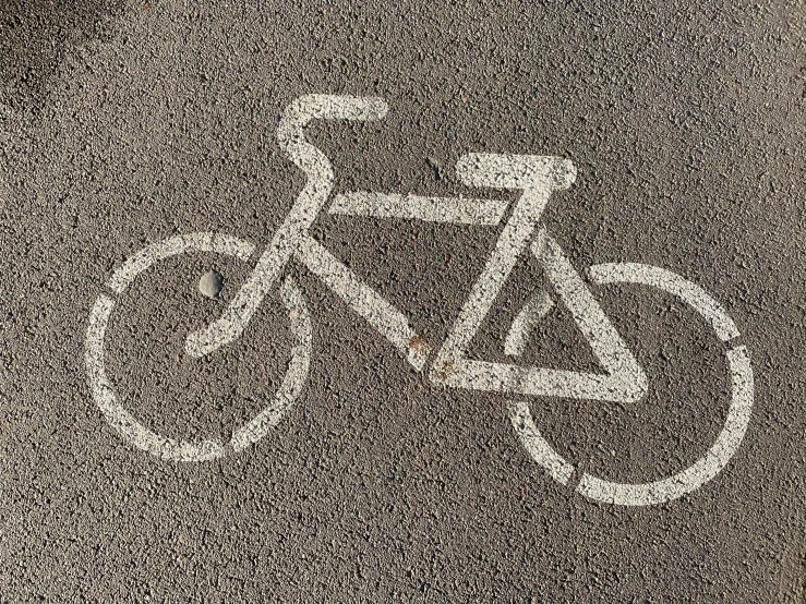 a black and white image of an abstract bicycle sign