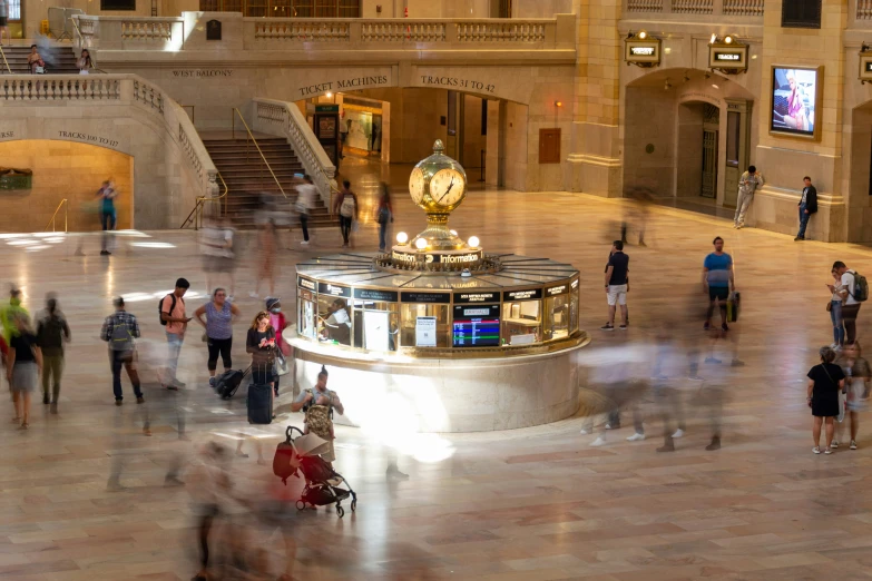 lots of people walking in a large building