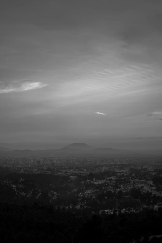 black and white pograph of mountains in the distance