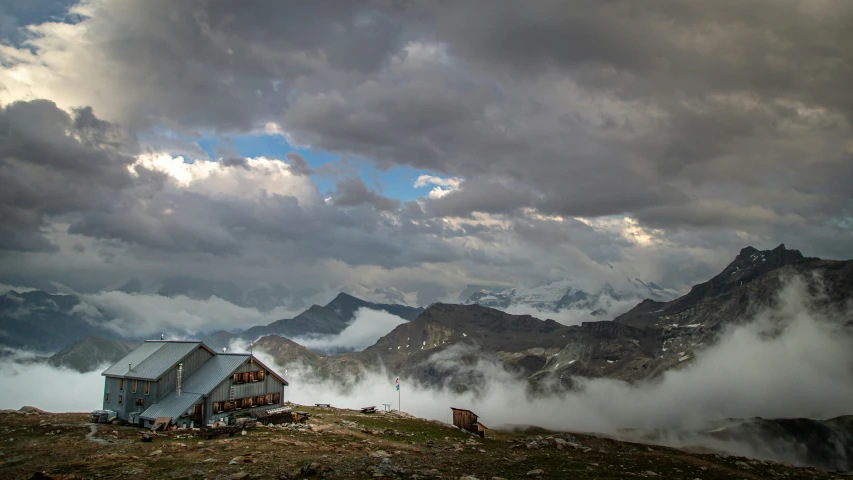 house in clouds on a hill on a cloudy day