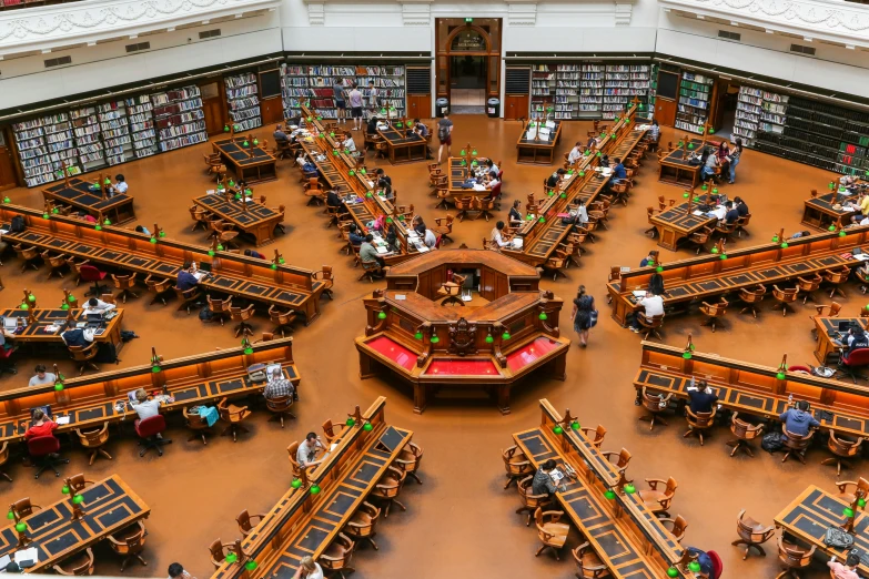 many tables are shown in a liry with a lot of books