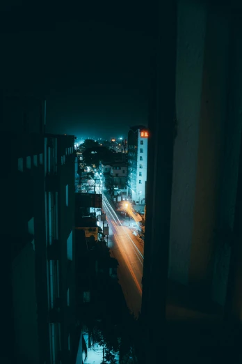 dark city night lights with buildings at the horizon