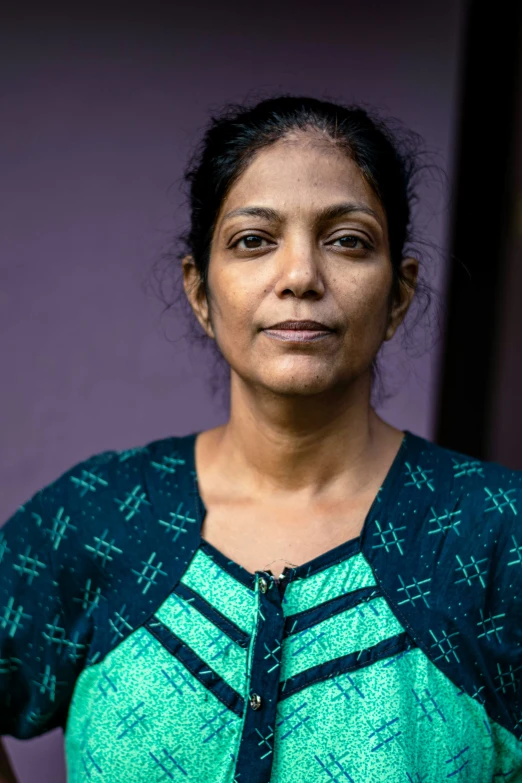 a woman is posing for the camera with her shirt on