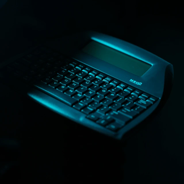 a close up of a keyboard and a computer mouse