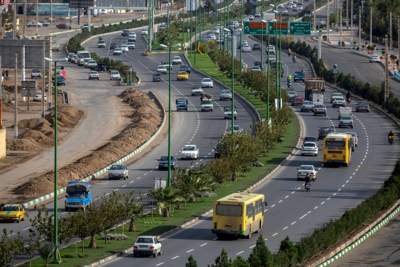 a busy city with a road filled with traffic