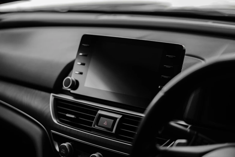 a car with a large display on the dashboard