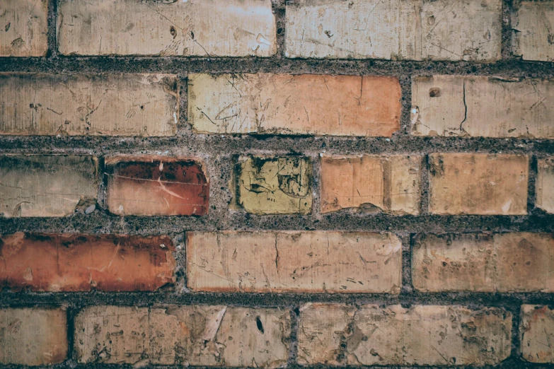 some brown bricks are being exposed together