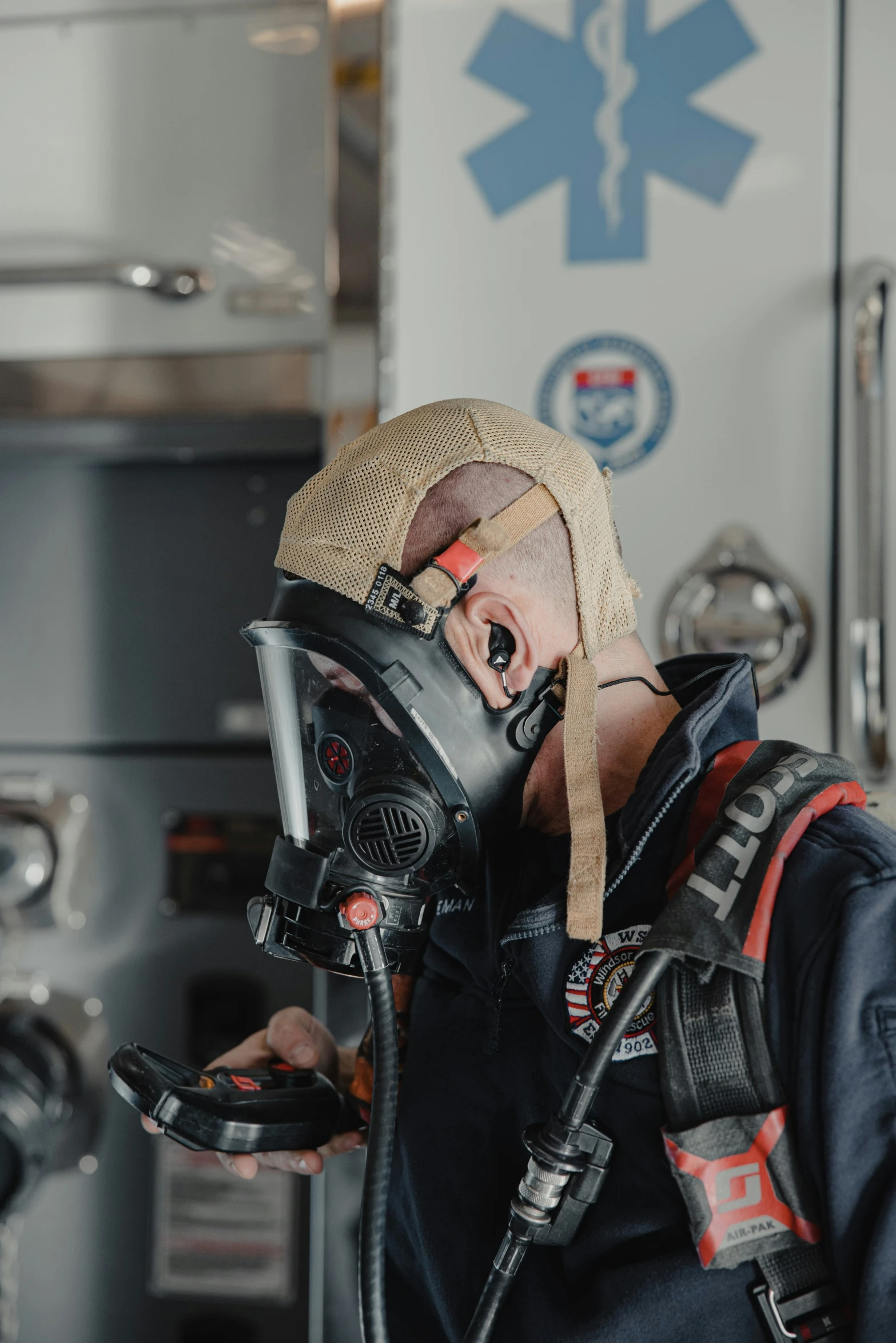 a person wearing a gas mask with a hat and goggles