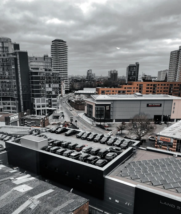 a parking lot that has several cars parked in it