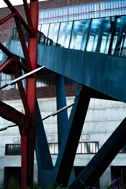 a close up of an iron structure near a building