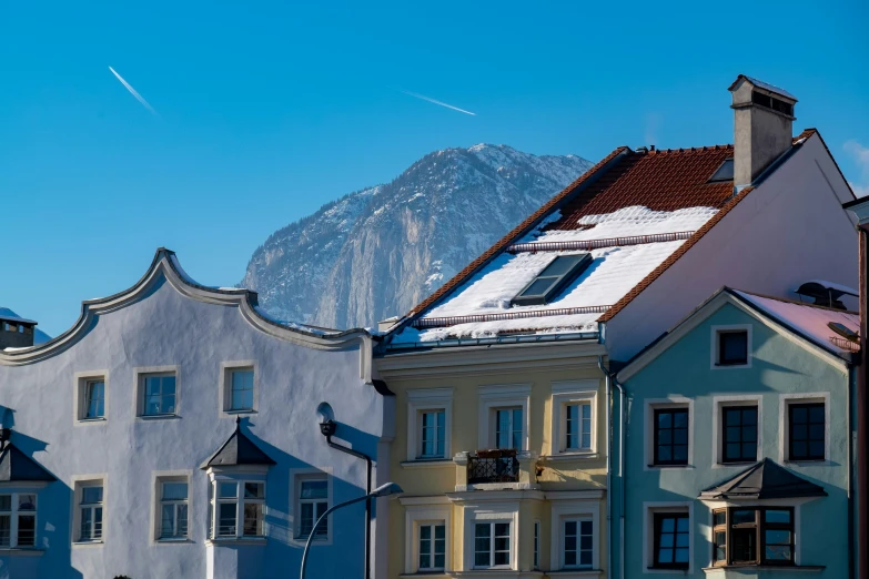 houses with the mountain in the background