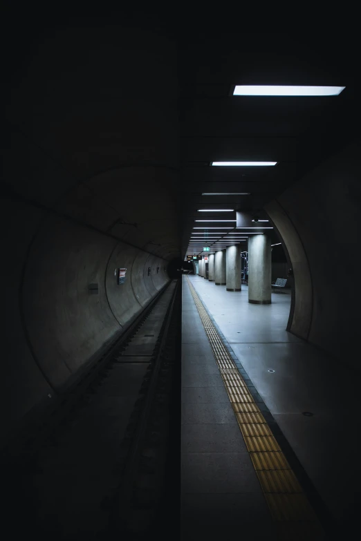 a subway train traveling through a tunnel