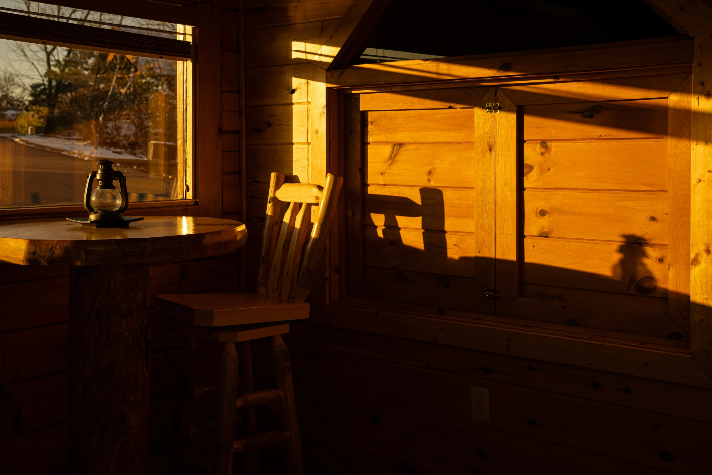 a chair sitting in front of a window