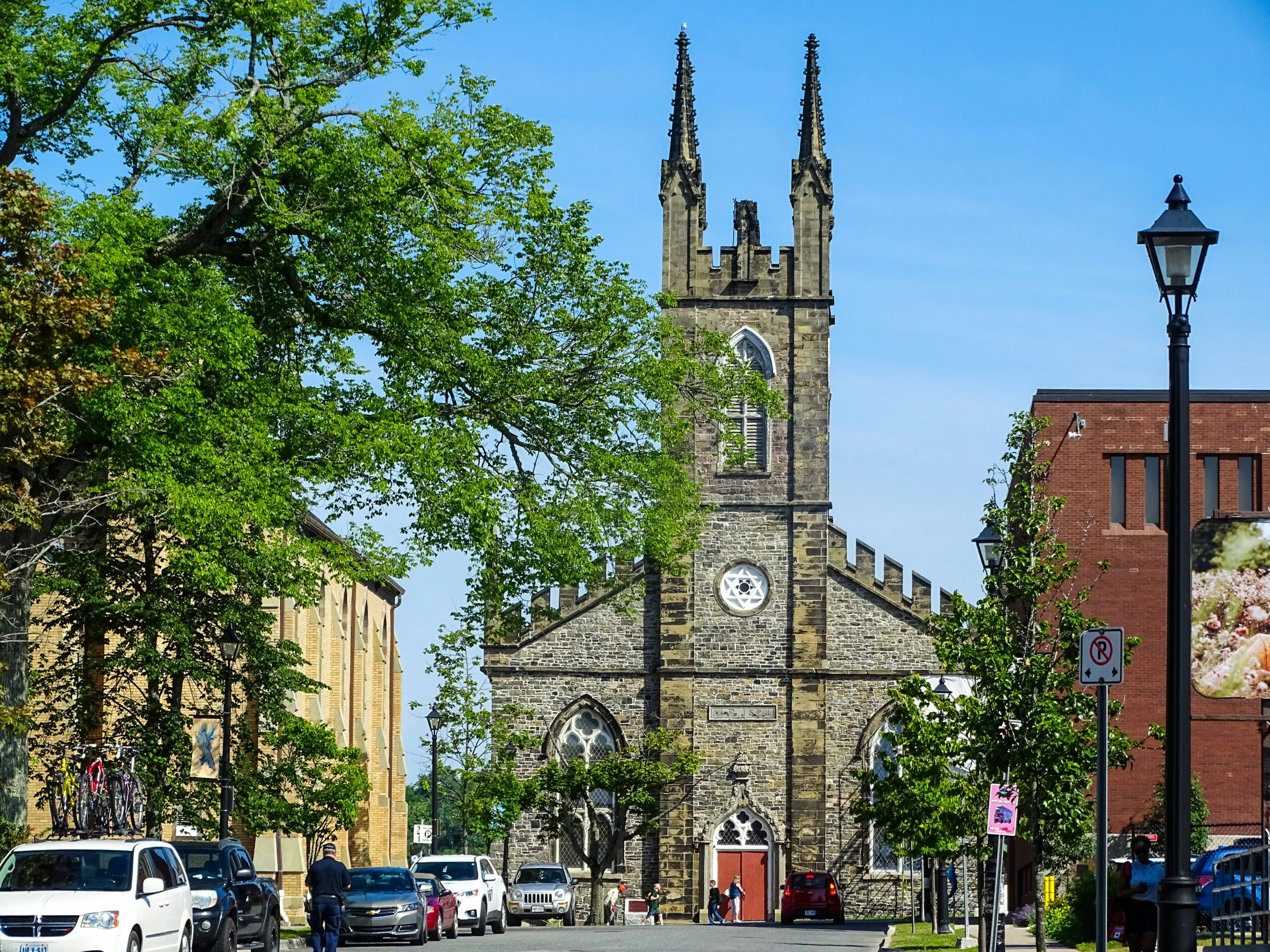 a beautiful church that has a clock at the top